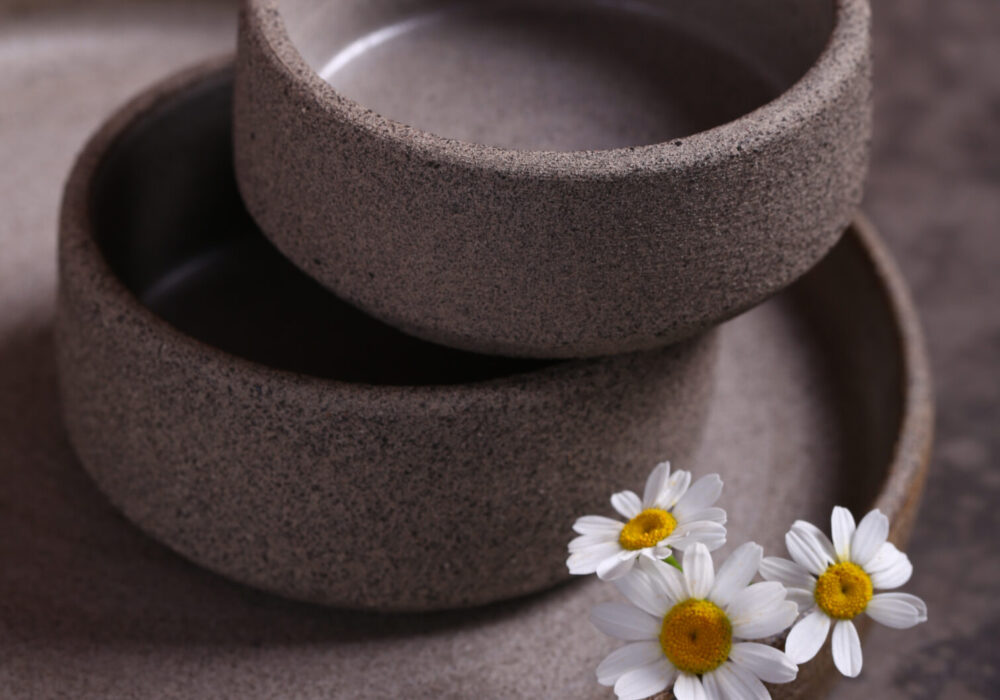 handmade ceramic craft ware on a gray background