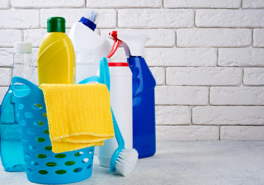 Cleaning background. Basket with cleaning products. Cleaning with supplies, service and clean house concept. Copy space